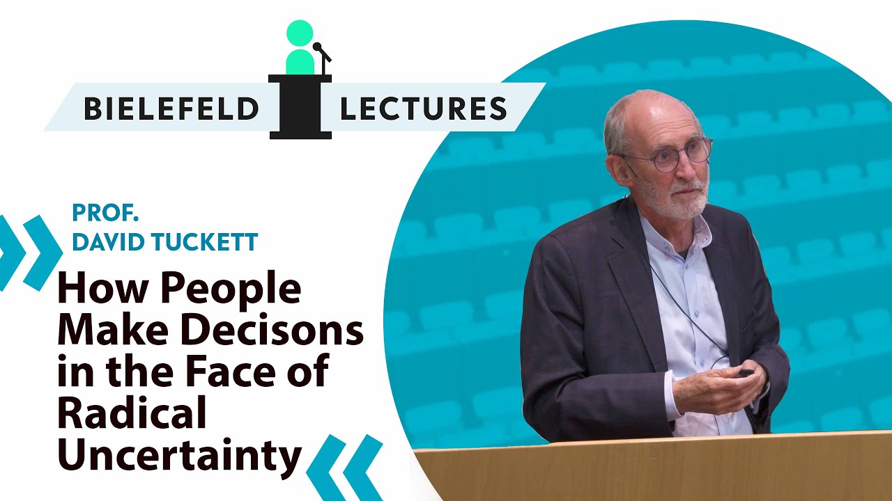 David Tuckett bei seiner Präsentation mit dem Logo der Bielefeld Lectures