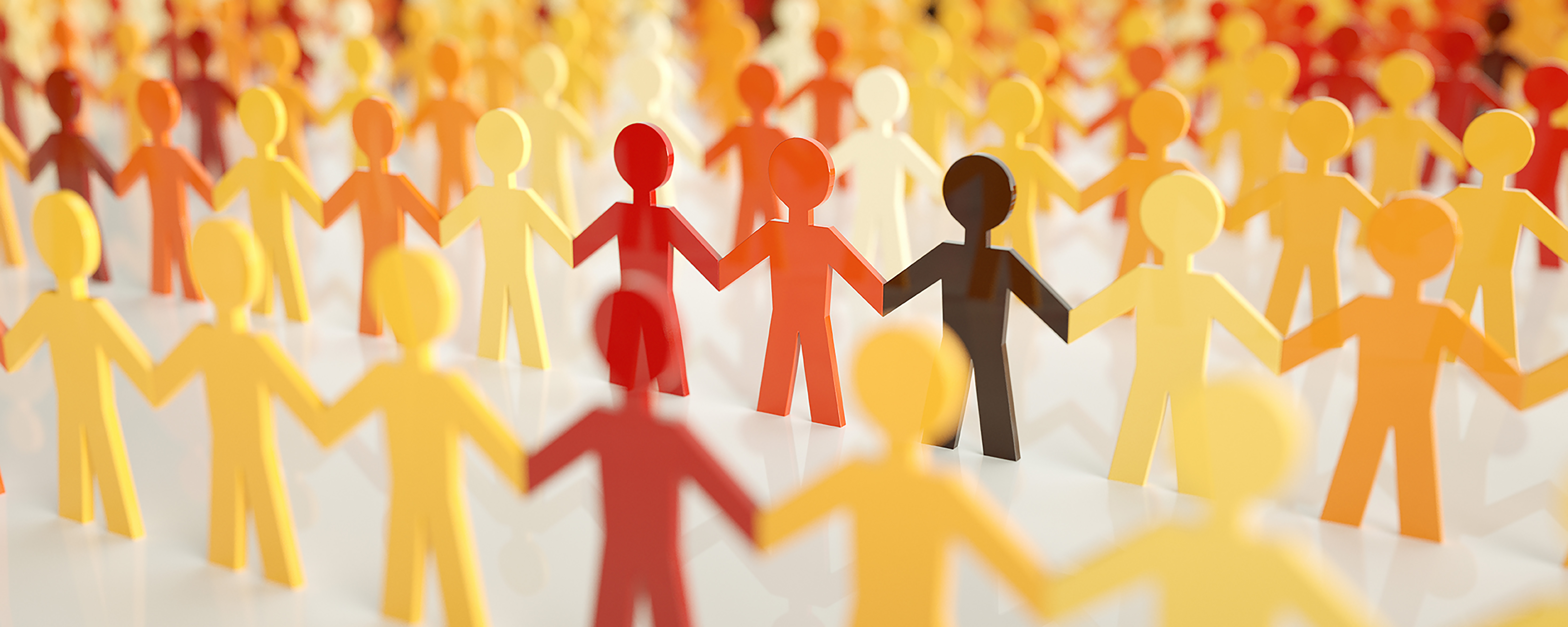 Plastic figures holding hands