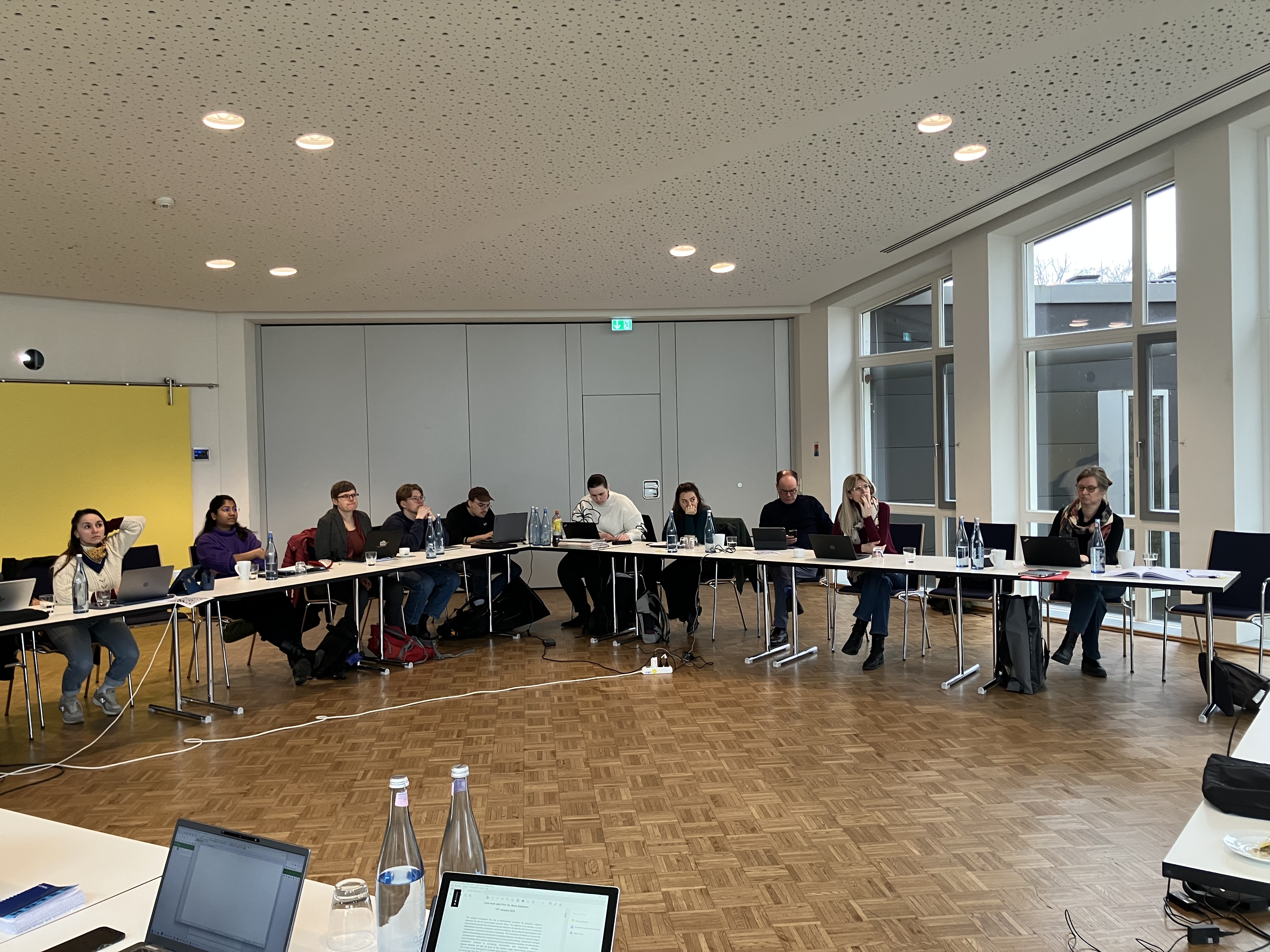 RTG 2951 Researchers in Conference Room at Haus Villigst, listening to presentation