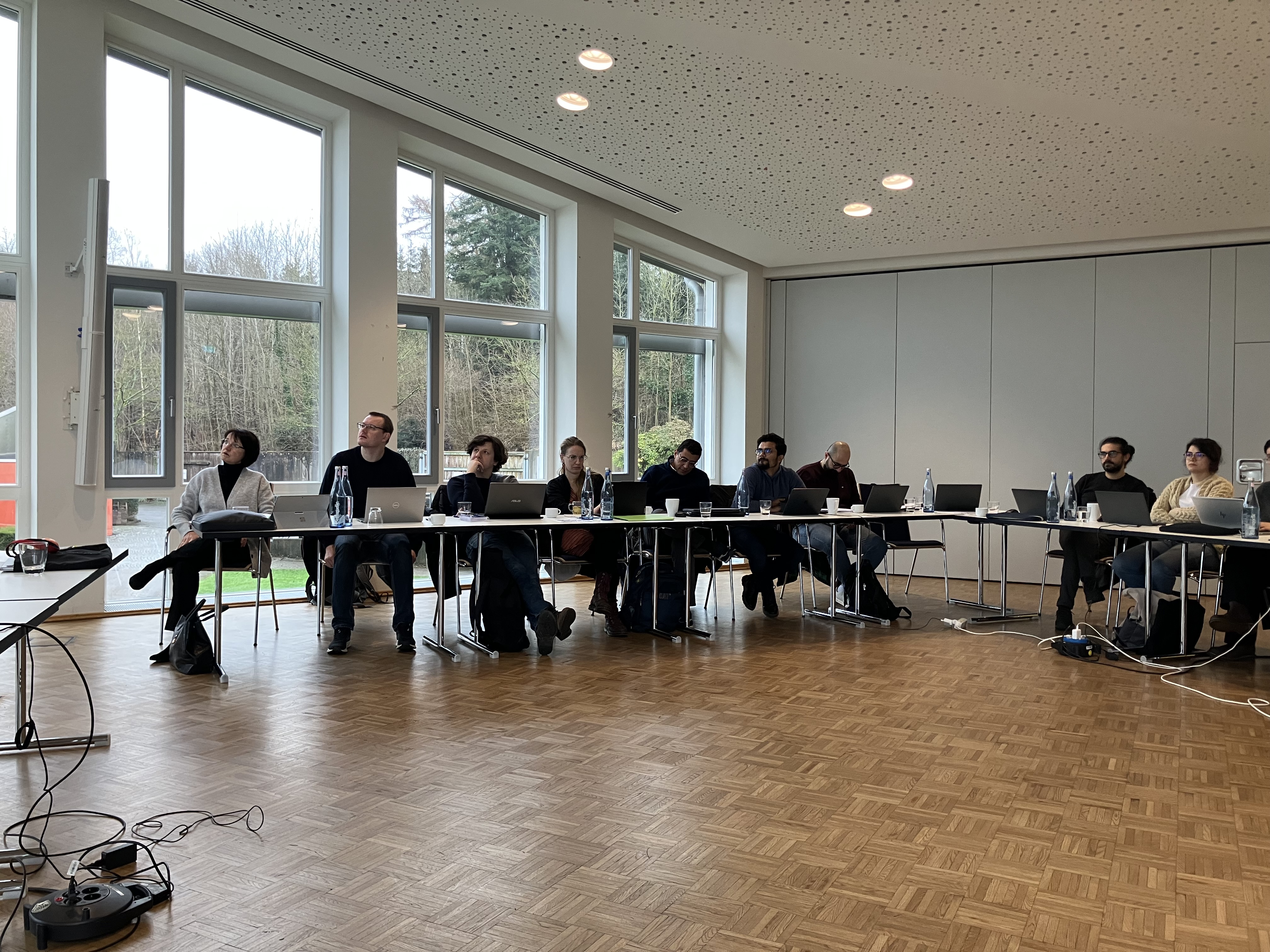 RTG 2951 Researchers in Conference Room at Haus Villigst, listening to presentation