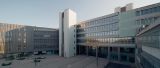 Entrance to Bielefeld University, with the IMW above it.