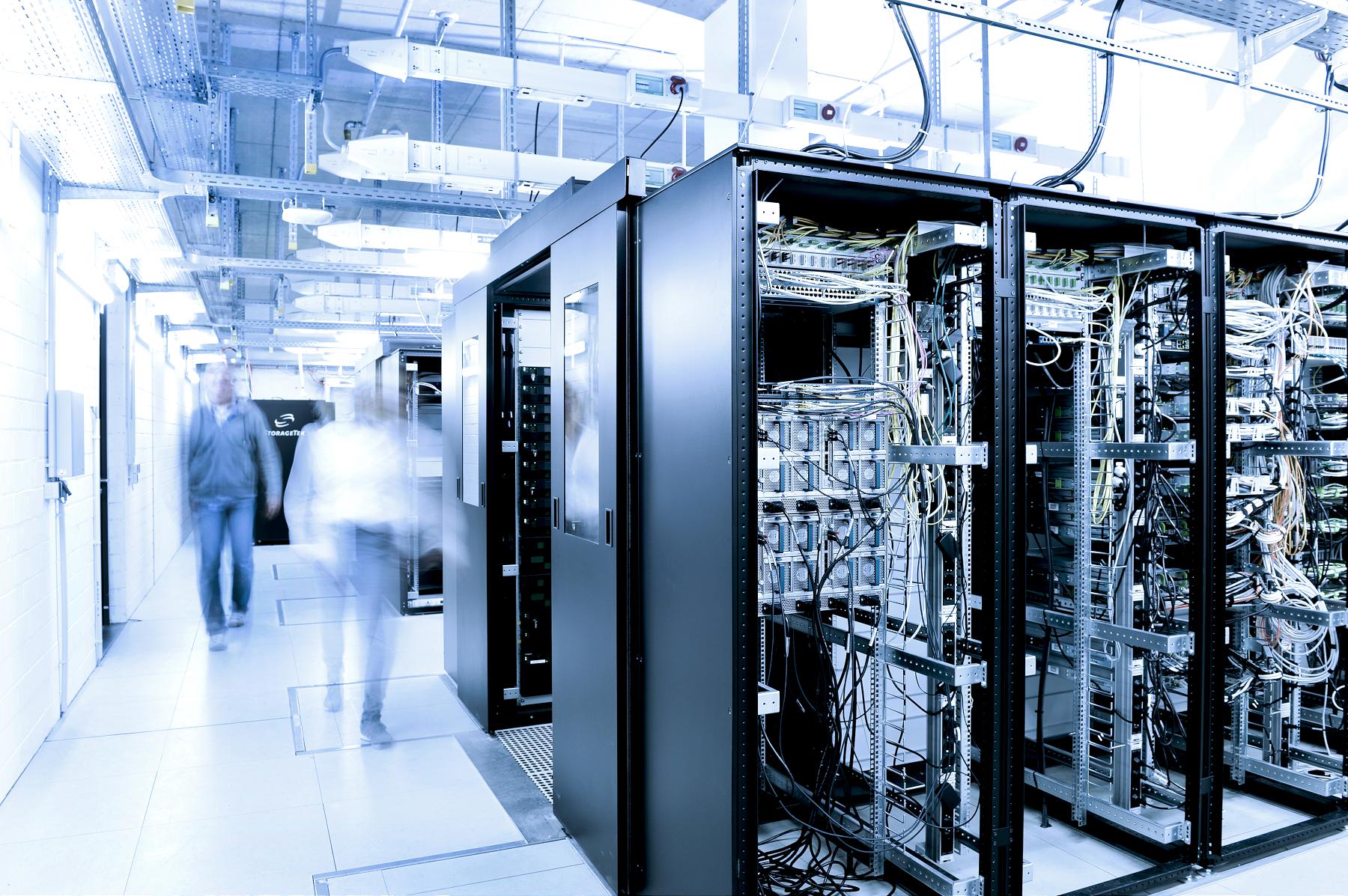 Two people in the data center