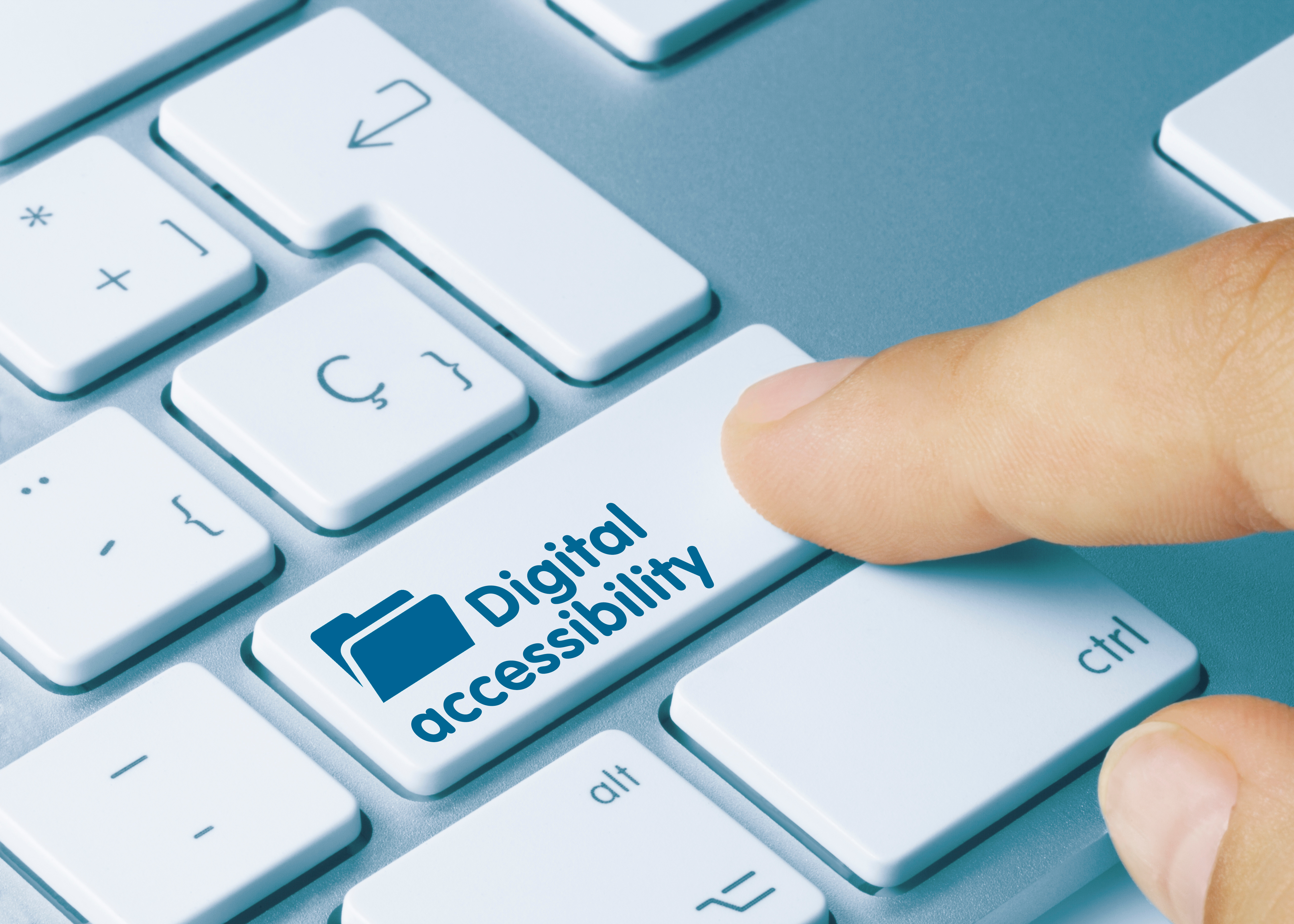 A button on the keyboard labeled "Digital Accessibility".