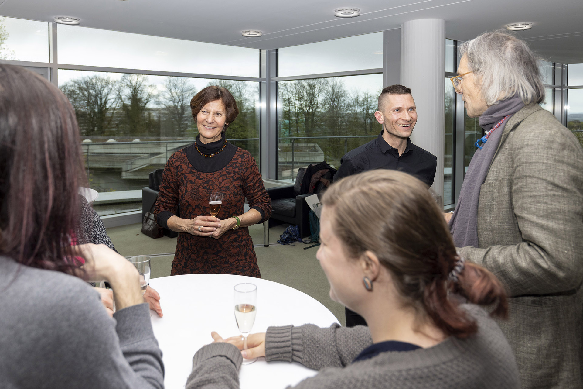 People chatting in the ZiF foyer