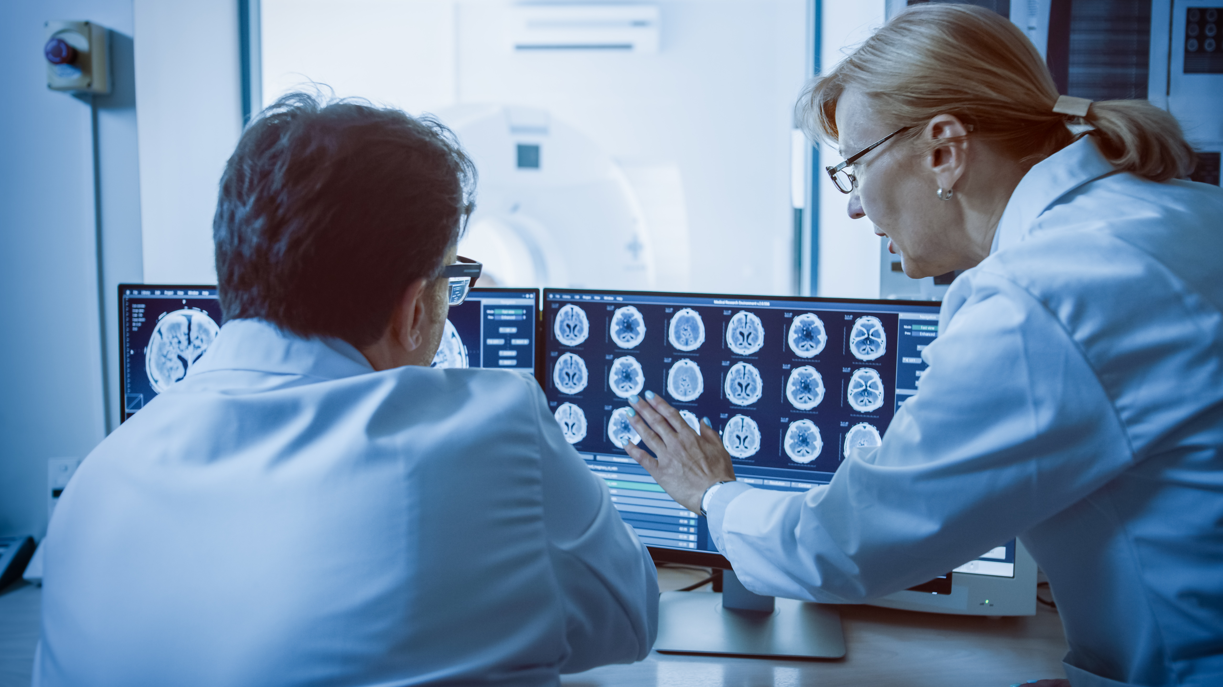 Doctors look at a neurology recording