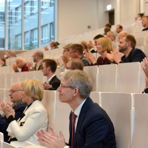 Applauding audience in a Lecture Hall