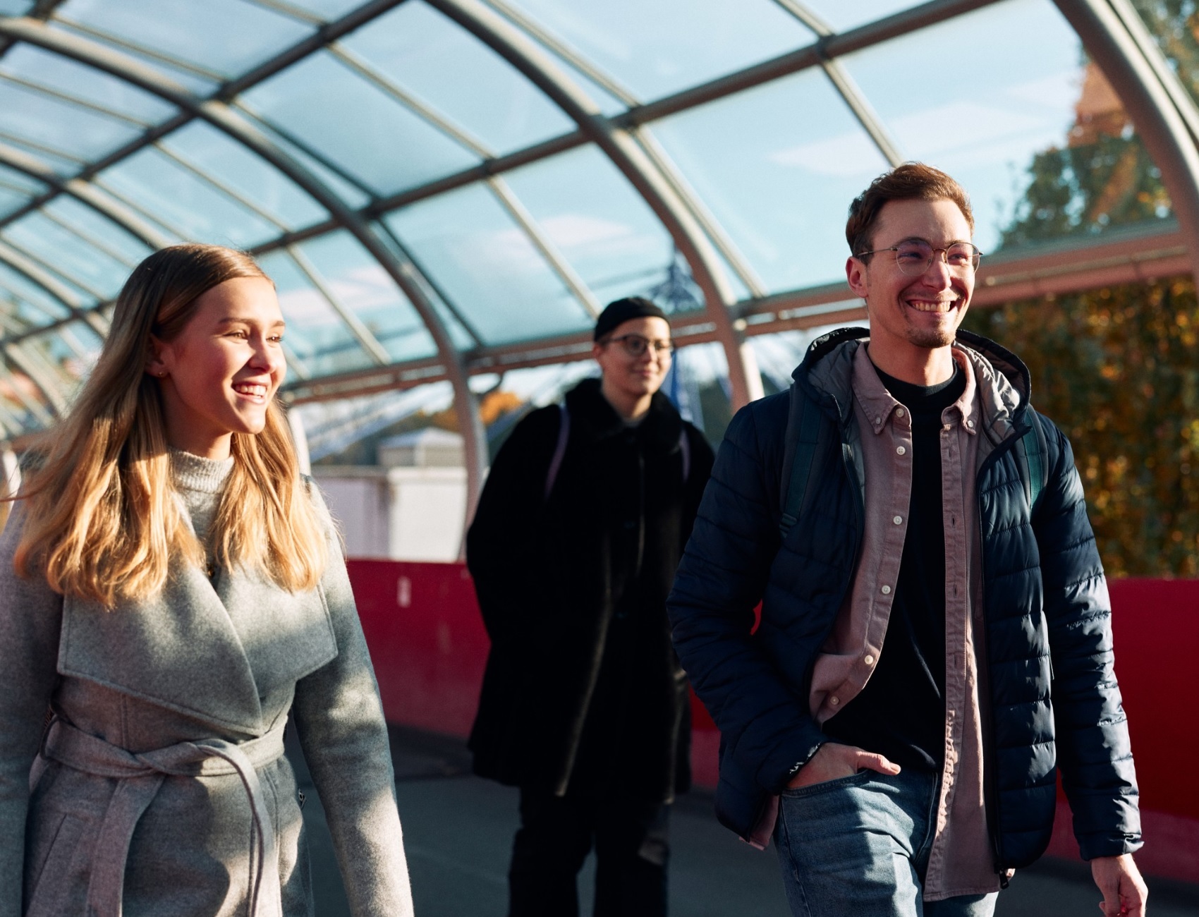 Students on the bridge to campus